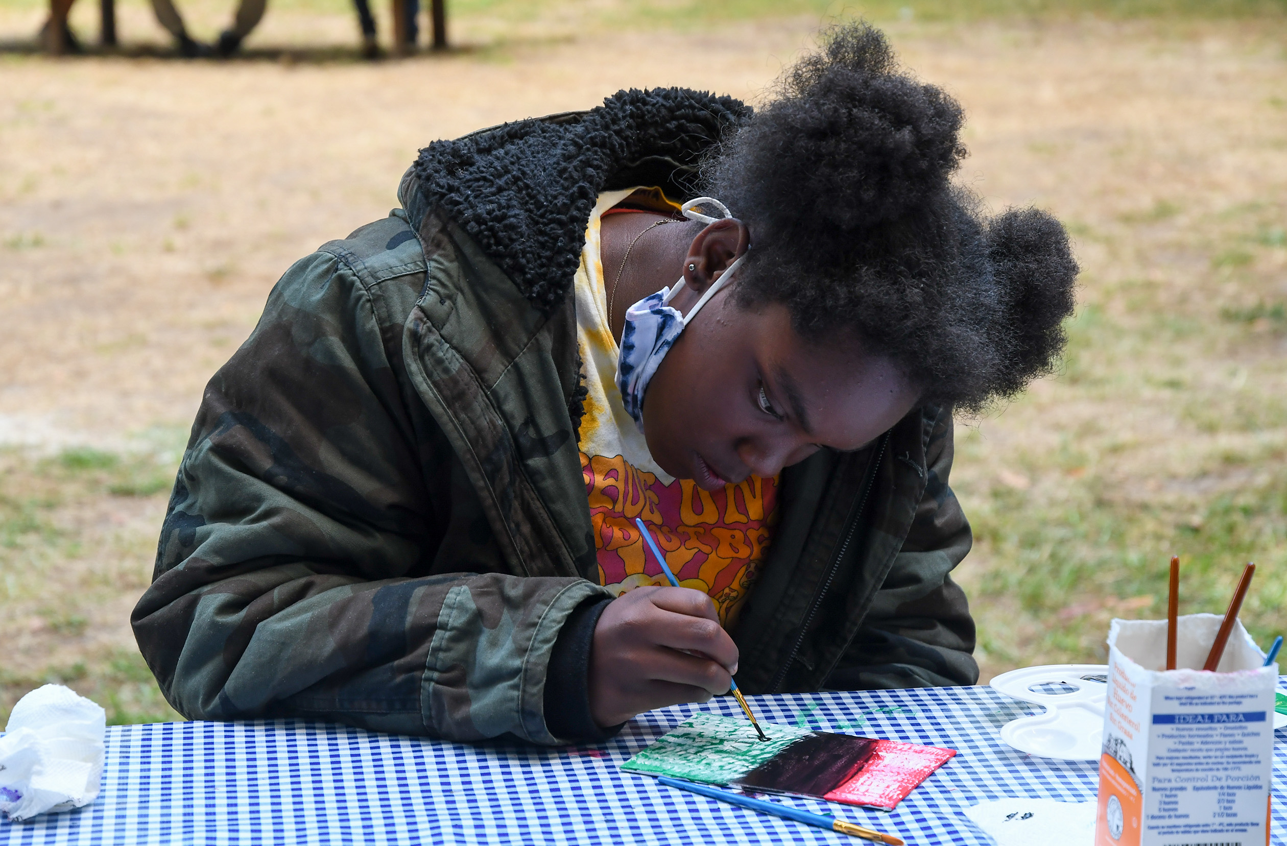 Camper painting during Wellness & Social Justice Hour